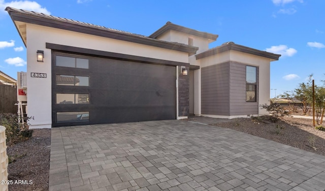 view of front of home with a garage