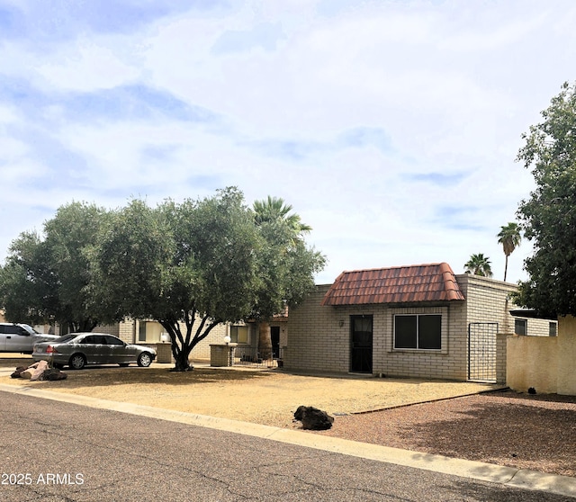 18227 N 40th Pl, Phoenix, AZ 85032 - view of front of property with mansard roof and fence
