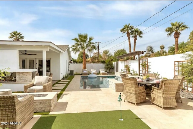 view of patio / terrace featuring a fenced in pool, an outdoor fire pit, and cooling unit