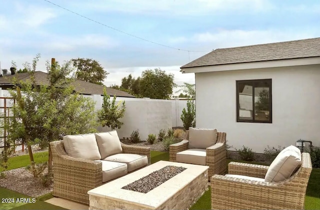 view of patio with an outdoor fire pit