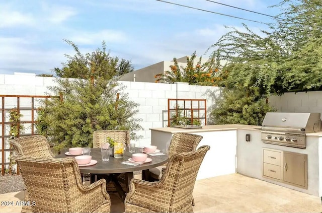 view of patio / terrace featuring a grill