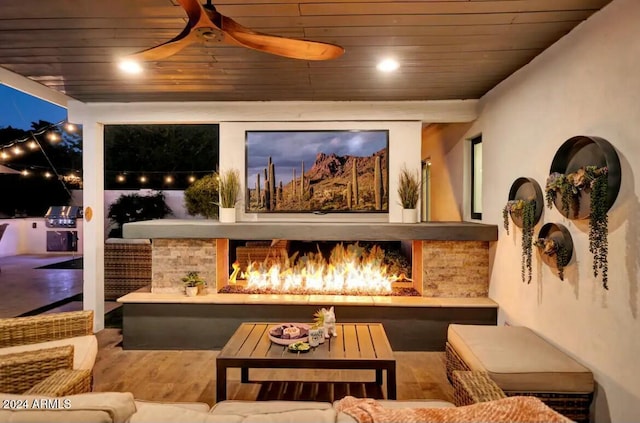 bar with ceiling fan, wood-type flooring, and wooden ceiling