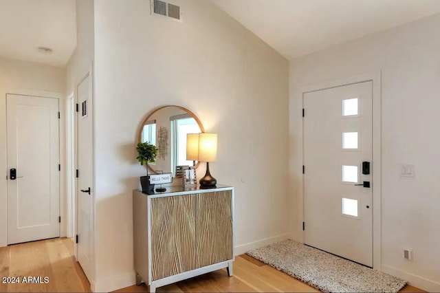 entrance foyer with light hardwood / wood-style floors