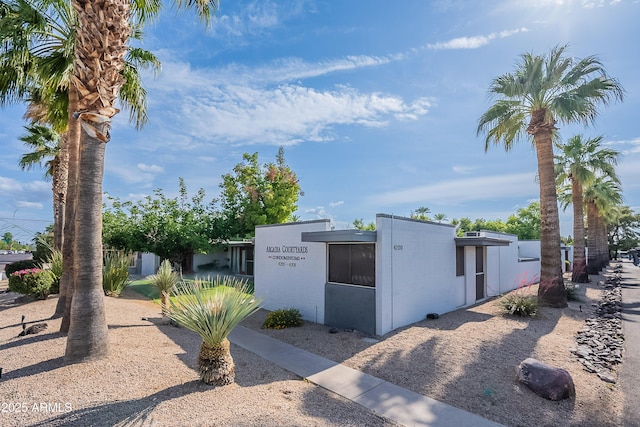 view of side of property with fence