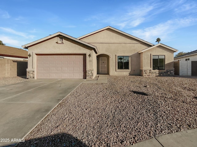 single story home featuring a garage