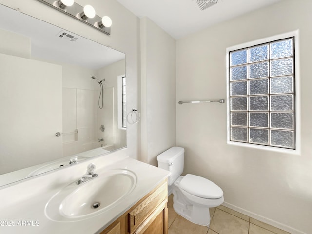 full bathroom featuring shower / tub combination, tile patterned floors, toilet, and vanity