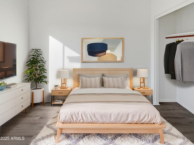 bedroom featuring dark hardwood / wood-style floors