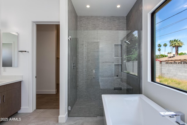 100 W Northern Ave Unit 12, Phoenix, AZ 85021 - full bath with recessed lighting, a freestanding tub, a shower stall, and vanity