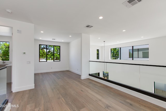 100 W Northern Ave Unit 12, Phoenix, AZ 85021 - spare room featuring visible vents, recessed lighting, light wood-style flooring, and baseboards