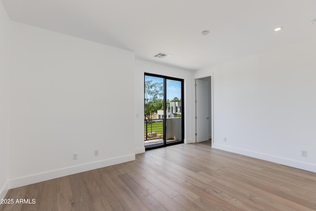 100 W Northern Ave Unit 12, Phoenix, AZ 85021 - spare room with recessed lighting, baseboards, visible vents, and light wood finished floors