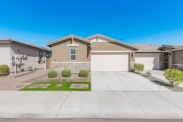 ranch-style home with a garage