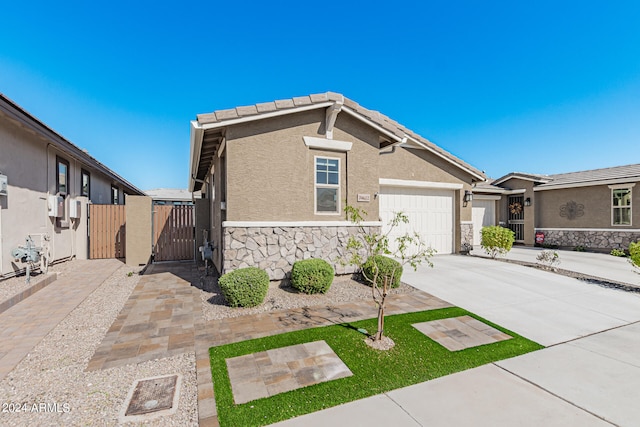 view of front of home featuring a garage