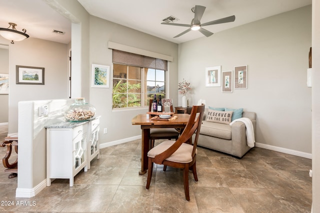 dining space featuring ceiling fan