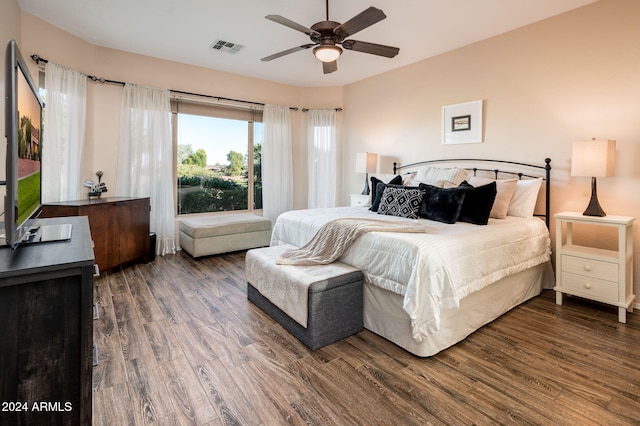 bedroom featuring dark wood-type flooring and ceiling fan