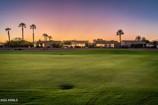 surrounding community featuring a yard