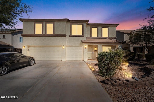 view of front of property with a garage