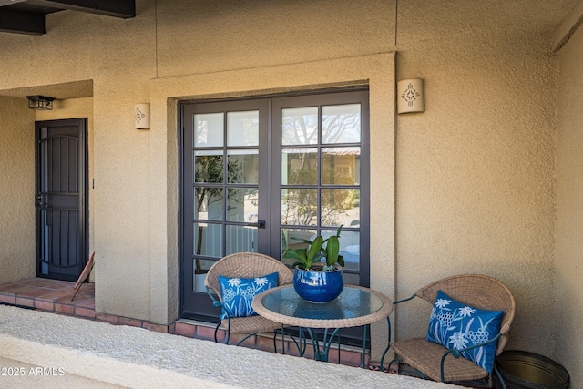 doorway to property featuring french doors