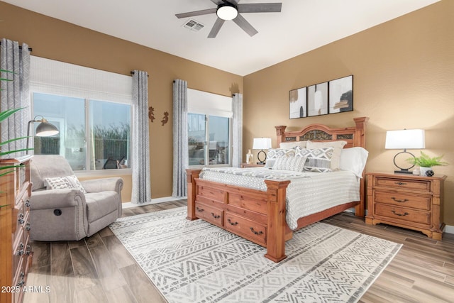 13102 S 177th Dr, Goodyear, AZ 85338 - bedroom featuring ceiling fan and light wood-type flooring