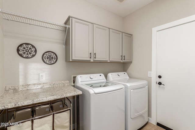 13102 S 177th Dr, Goodyear, AZ 85338 - laundry room with cabinets and washer and clothes dryer