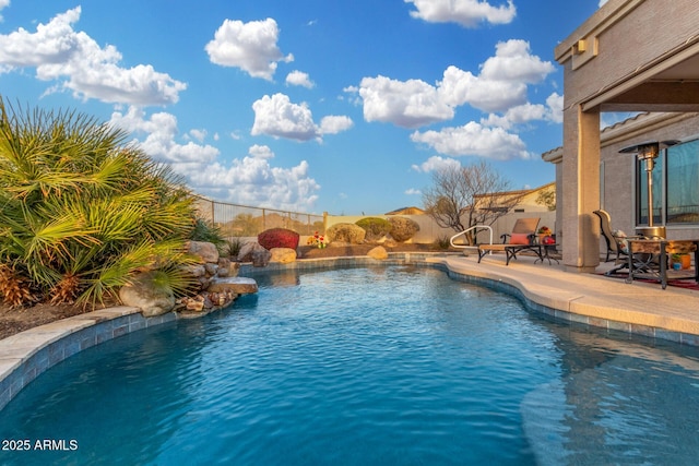 13102 S 177th Dr, Goodyear, AZ 85338 - view of swimming pool featuring a patio area