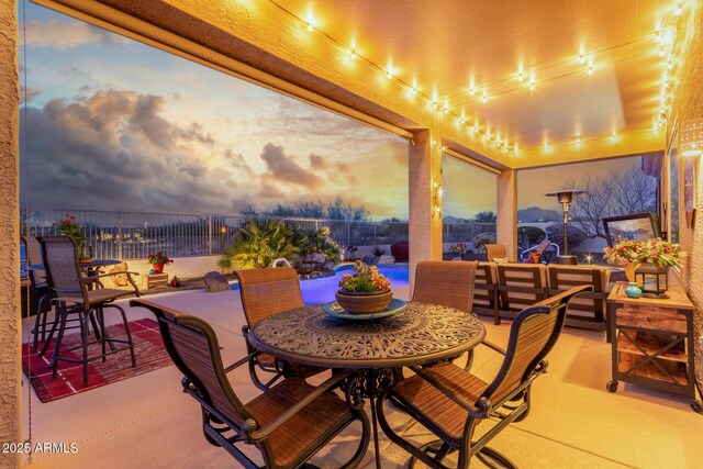 13102 S 177th Dr, Goodyear, AZ 85338 - patio terrace at dusk featuring outdoor lounge area