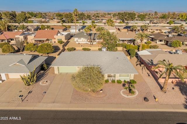 birds eye view of property featuring a mountain view