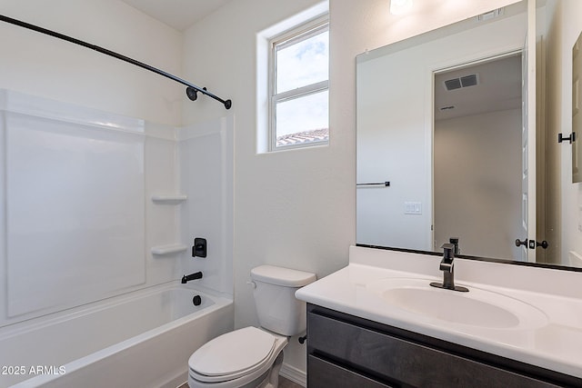 bathroom with washtub / shower combination, vanity, visible vents, and toilet