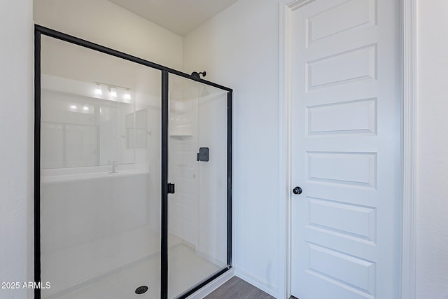 full bathroom with a shower stall
