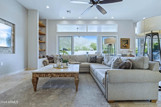 living room with ceiling fan