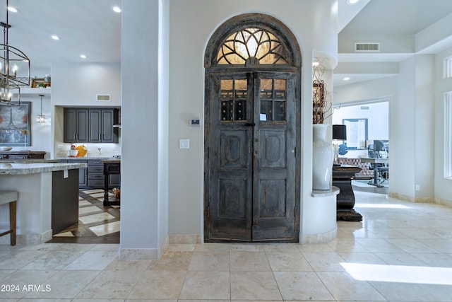 entrance foyer featuring light tile patterned floors