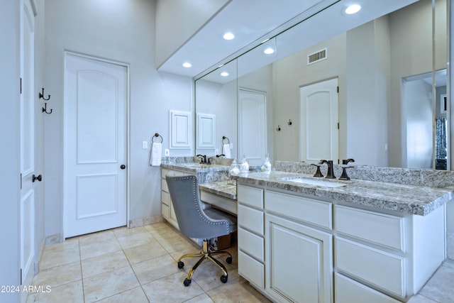 bathroom featuring vanity and tile patterned floors