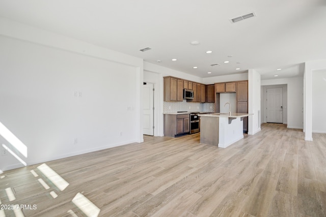 4053 Desert Moon Dr, Wickenburg, AZ 85390 - unfurnished living room featuring recessed lighting and light wood-type flooring