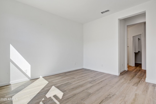 4053 Desert Moon Dr, Wickenburg, AZ 85390 - spare room featuring light wood finished floors and baseboards