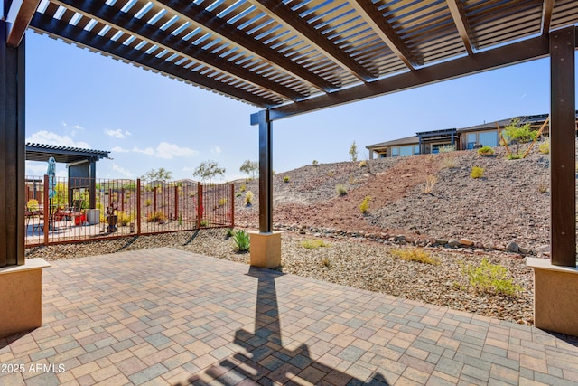 4053 Desert Moon Dr, Wickenburg, AZ 85390 - fenced backyard featuring a patio area and a pergola