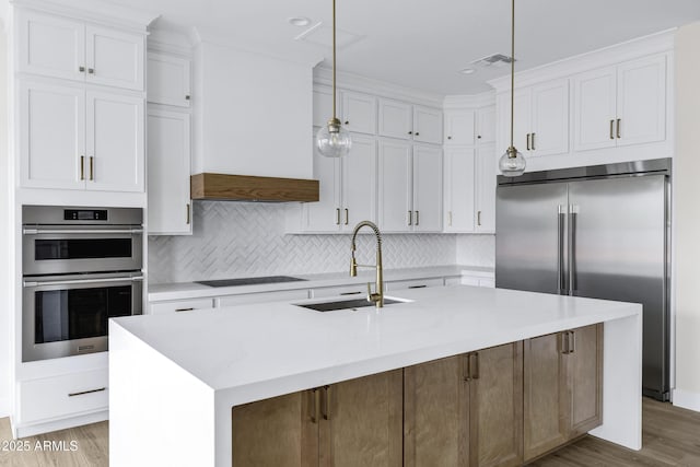 26619 S 169th Pl, Queen Creek, AZ 85142 - kitchen featuring stainless steel appliances, a sink, white cabinetry, and recessed lighting