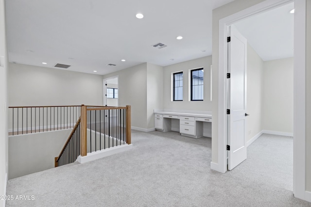 26619 S 169th Pl, Queen Creek, AZ 85142 - hallway featuring light colored carpet, a desk, an upstairs landing, recessed lighting, and baseboards
