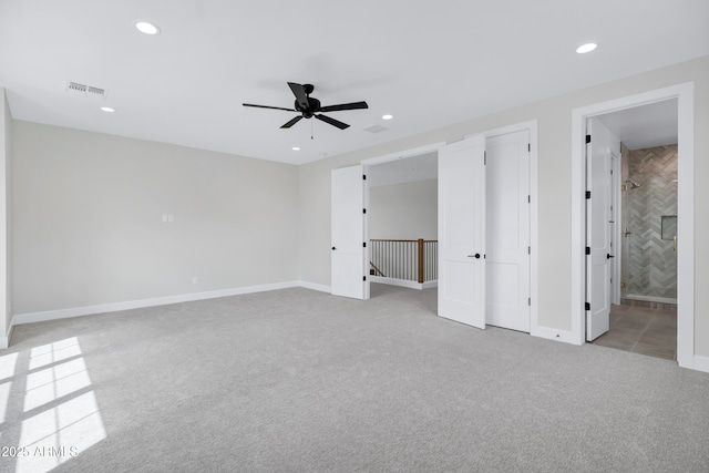26619 S 169th Pl, Queen Creek, AZ 85142 - unfurnished bedroom with light colored carpet, recessed lighting, baseboards, connected bathroom, and ceiling fan