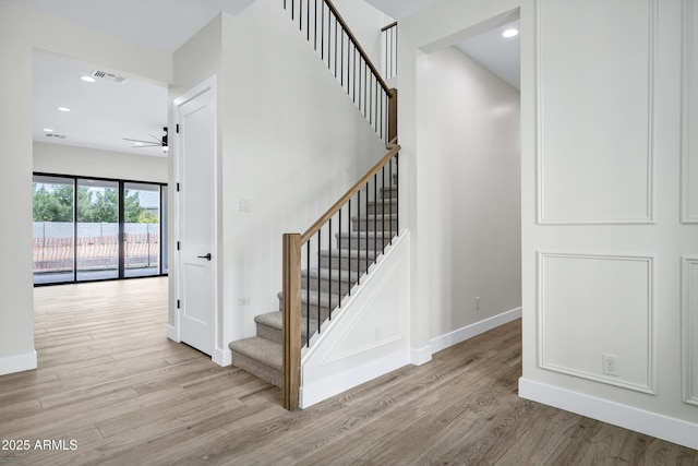 26619 S 169th Pl, Queen Creek, AZ 85142 - staircase with wood finished floors, ceiling fan, baseboards, and recessed lighting