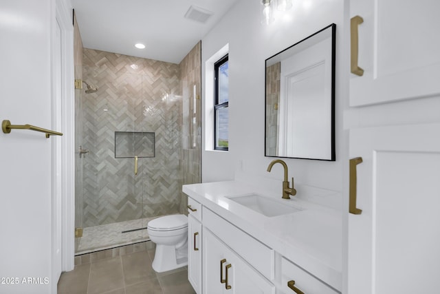 26619 S 169th Pl, Queen Creek, AZ 85142 - bathroom with tile patterned floors, a tile shower, toilet, and vanity