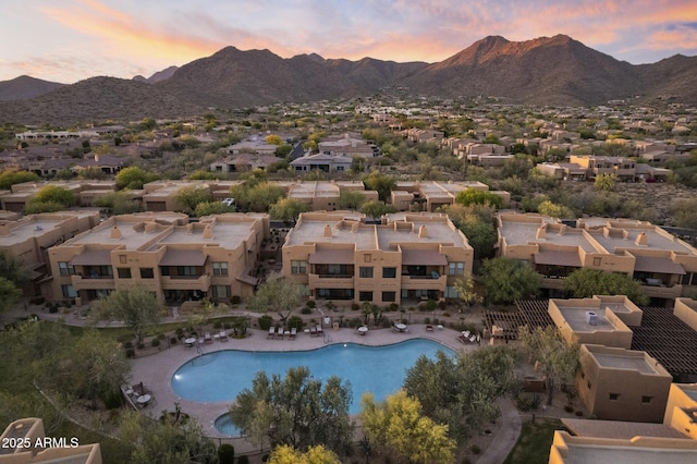 drone / aerial view with a residential view and a mountain view