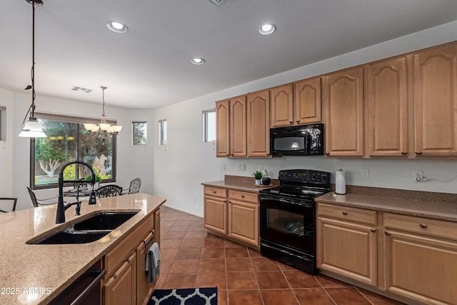 3023 E Silversmith Trl, San Tan Valley, AZ 85143 - kitchen featuring visible vents, recessed lighting, hanging light fixtures, black appliances, and a sink