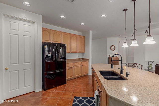 3023 E Silversmith Trl, San Tan Valley, AZ 85143 - kitchen with light stone counters, recessed lighting, light tile patterned flooring, black fridge with ice dispenser, and a sink