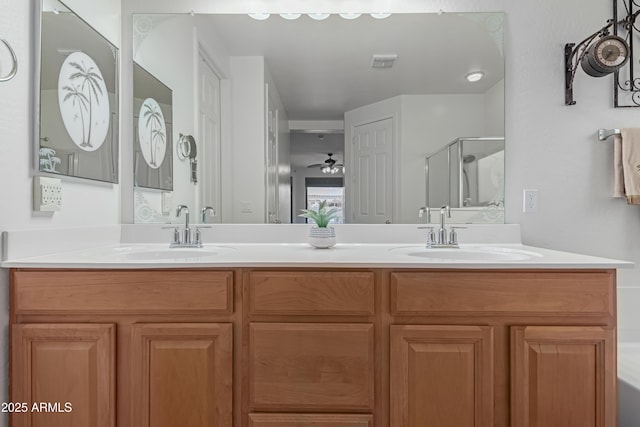 3023 E Silversmith Trl, San Tan Valley, AZ 85143 - full bathroom featuring a sink, visible vents, a stall shower, and double vanity