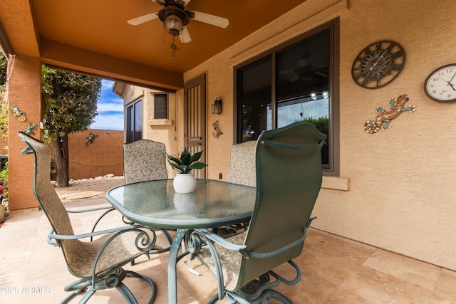 3023 E Silversmith Trl, San Tan Valley, AZ 85143 - view of patio with outdoor dining area, a ceiling fan, and fence
