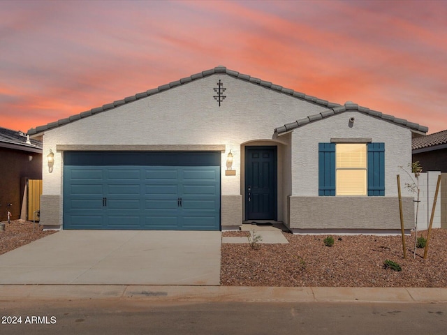 view of front of home featuring a garage