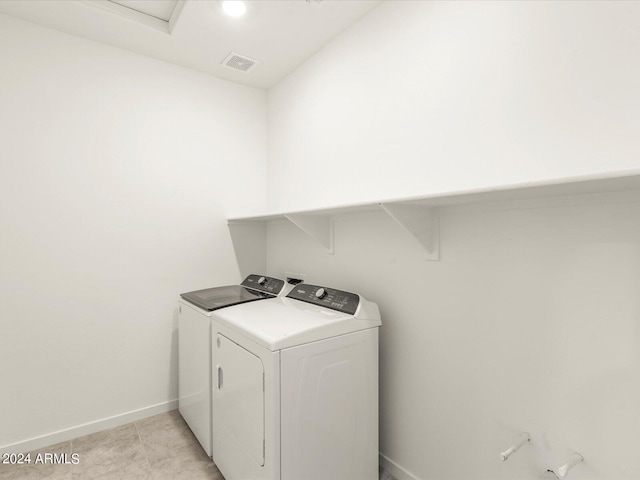 laundry area featuring washer and clothes dryer