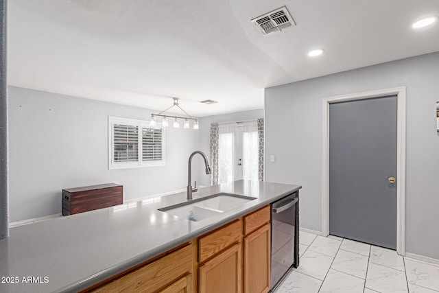 kitchen featuring visible vents, dishwasher, marble finish floor, recessed lighting, and a sink