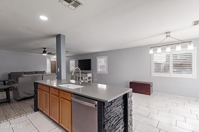 kitchen with a sink, stainless steel dishwasher, open floor plan, marble finish floor, and visible vents