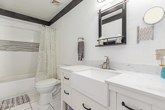 bathroom featuring visible vents, marble finish floor, toilet, vanity, and shower / bathtub combination with curtain