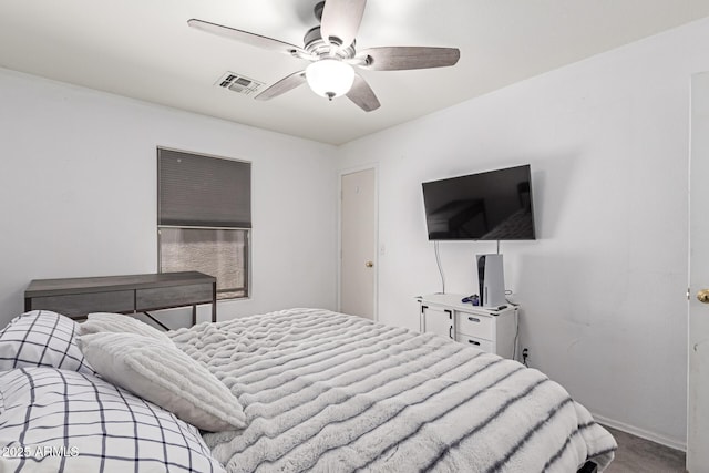 bedroom with carpet floors, baseboards, ceiling fan, and visible vents